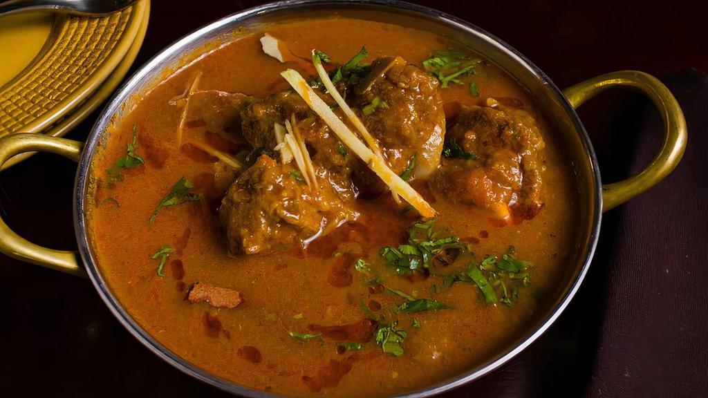 Jashan Goat Curry · Homestyle punjabi bone-in goat curry.