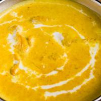 Lamb Korma · Lamb in a mild creamy curry with cashew nuts, raisins, and fenugreek.