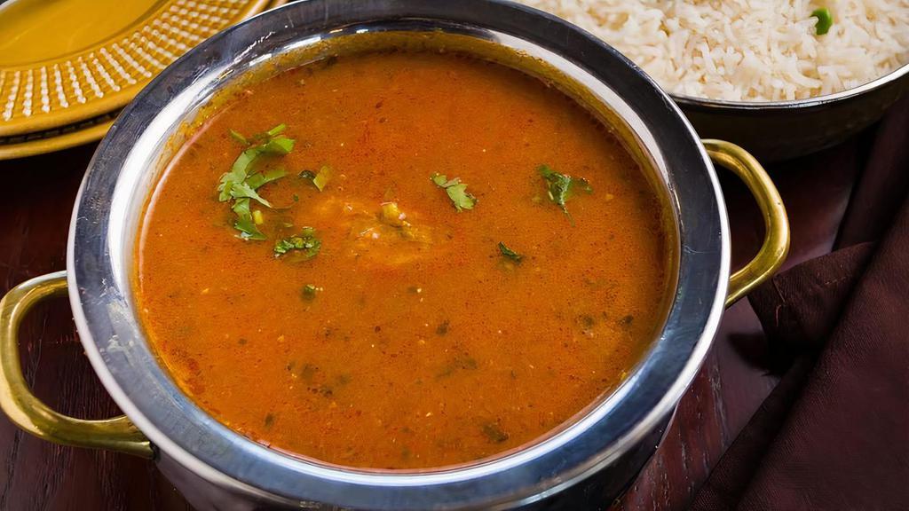 Goan Fish Curry · Tamarind & coconut gravy, curry leaves, fish.