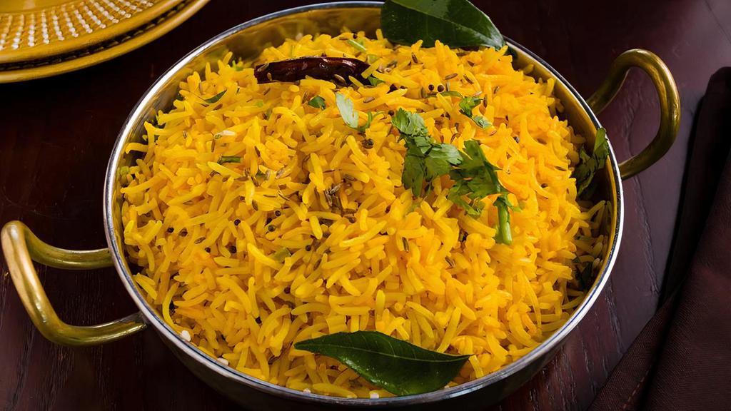 Lemon Rice · Temprered mustard seed & curry leaves.