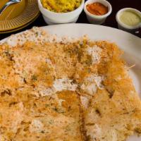 Rava Masala Dosa · Crepe made of rice flour and cream of wheat with mashed potatoes and onions
