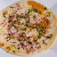 Onion Chili Uttapam · Rice and lentil pancakes with onion chilly
