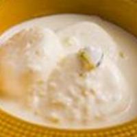 Ras Malai · Dumplings made from cheese soaked in sweetened thickened milk.