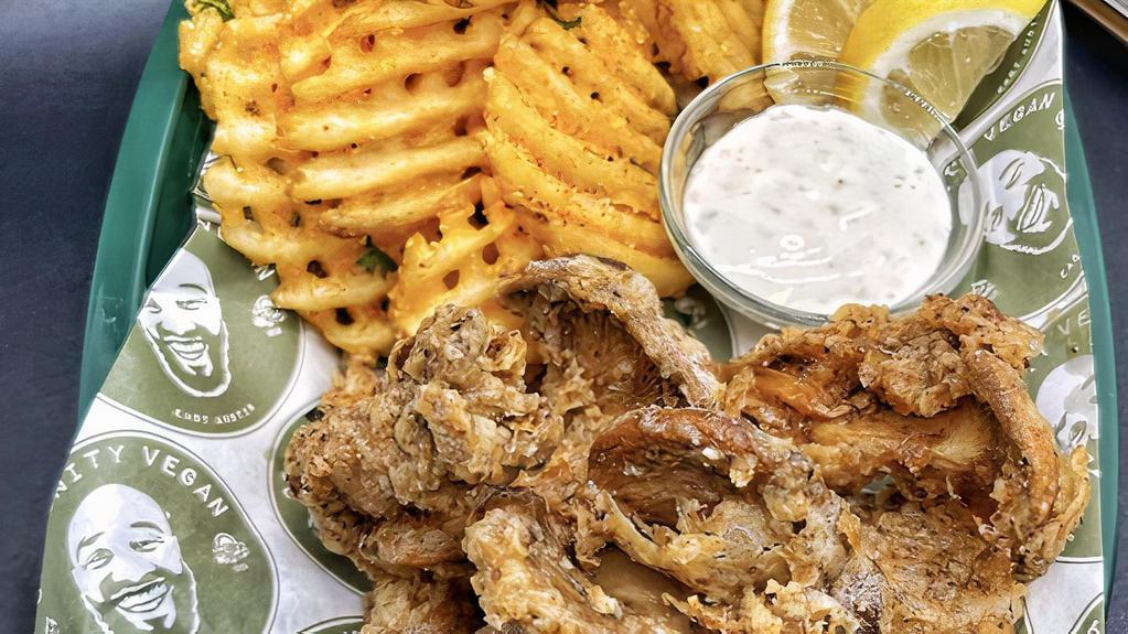 Lemon Pepper Wangz Basket · Fried oyster mushrooms, heavy on the lemon pepper flavoring, your favorite dipping sauce & waffle fries as the sidekick. #powpow. Dirty Version:  add red pepper flakes & jalapeno’s  |  extra  $.50