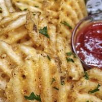 Waffle Fries · Herbed & salted waffle fries!