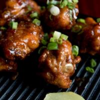 Tebasaki Chicken Wings · Six (6) fresh chicken wings drizzled with the sauce of your choice.
