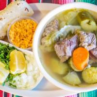 Caldo De Res Soup · Beef soup with carrots, potatoes, squash, cabbage, chayote. Served with cilantro, onion, and...