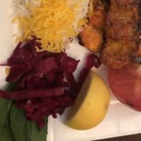 Chicken Sultani Kebob · One skewer of chicken strip and one skewer of chicken koobideh.