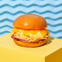Ham, Egg And Cheese · Savory ham, a fried egg, and your choice of cheese on a brioche bun.