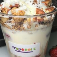 Fresas Con Crema · Strawberries and cream topped with granola, pecans, coconut flakes, and lechera.