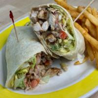 Grilled Chicken Sandwich · Grilled chicken, Swiss cheese, lettuce, red onions, tomatoes & house dressing; served on a h...