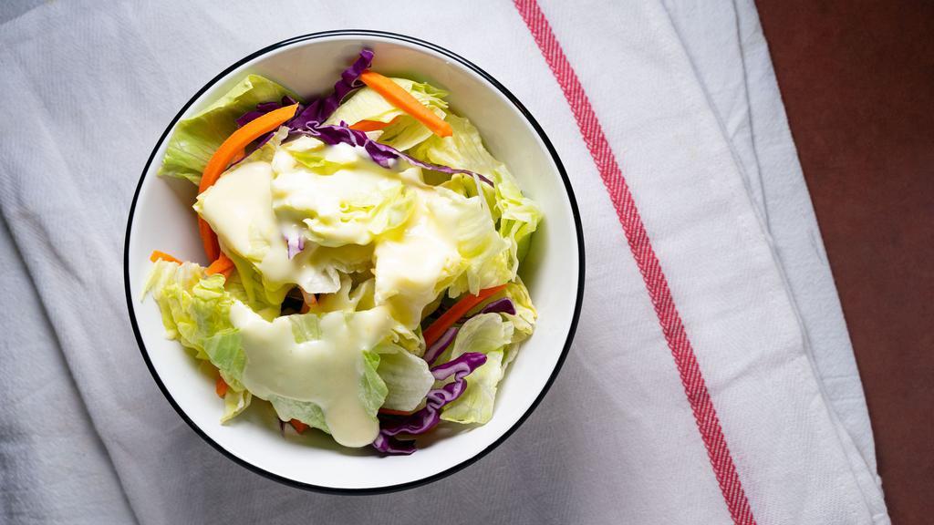 Salad · This classic and simple salad is crisp and refreshing. A cold wedge of iceberg lettuce topped with a homemade creamy dressing. Perfect as a side dish for any meal.
