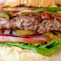 Jalapeño Burger · 8 oz. beef patty mixed with jalapeño, poblano peppers, and onions on a toasted bun served wi...