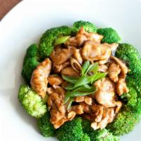Ginger Broccoli · Simmered in stock, served in a light brown sauce with scallions on a bed of steamed broccoli.