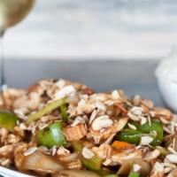 Almond Cashew · Bell peppers, onions, carrots, baby corn, and celery stir fried in a garlic soy sauce, toppe...