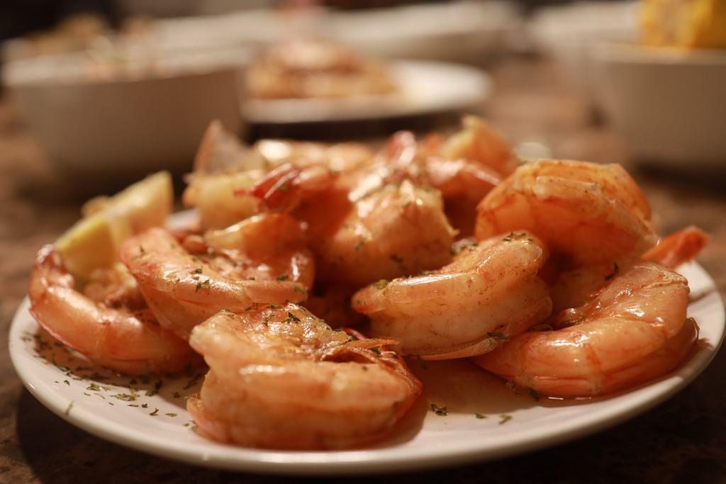 6Pc Boiled Shrimp  · Topped with Bj's special sauce
