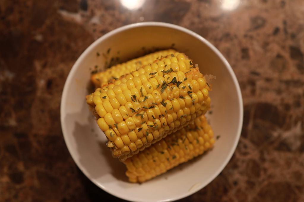 Boiled Corn · Topped with Bj's Special Sauce