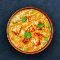 Paneer Tikka Masala · Oven cooked pieces of cottage cheese in a rich creamy tomato and onion based gravy. Served w...