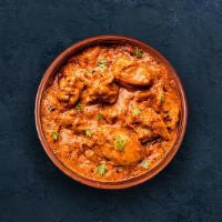 Chicken Butter Masala · Grilled chicken morsels braised in a tomato and butter sauce, seasoned with aromatic spices....