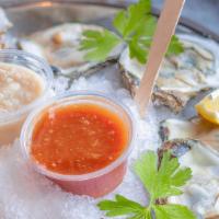 Steamed Oysters · House Special Blend, Garlic Butter, Cajun, or Lemon Pepper.
