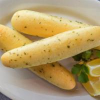 Garlic Breadsticks · Comes with 4 breadsticks and a side of garlic butter.