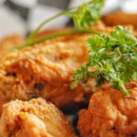 Crispy Chicken Wings (8Pc) · Tossed in your choice of: Buffalo Sauce, Salt & Pepper, Lemon Pepper, Mumbo Sauce or Old Bay.