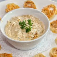 Crab Dip · A blend of crab & spinach baked in cream sauce & served with cheesy bread slices.