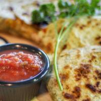 Quesadilla · Grilled Monterey Jack and Cheddar cheese stuffed in a tortilla.
Chicken or Shrimp ($3 upchar...