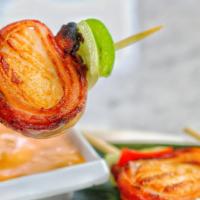 Bacon Wrapped Scallops(3Pc) · Sautéed Scallops, Each Wrapped in Bacon w Spicy Sauce.