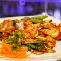 Hunan Style'S · Hot and spicy.  Peppered chicken or beef with Broccoli, baby corn, bell peppers, onion, bamb...