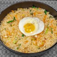 Egg Fried Rice · This fried rice comes with white rice and specially seasoned vegetables like leaks, carrot, ...