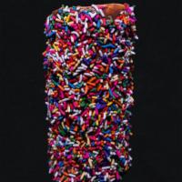 Rainbow Sprinkles Chimney Cake · Chimney roll, glazed with warm Nutella and sprinkled with rainbow sprinkles. Traditional swe...