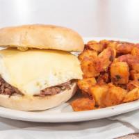 Steak, Egg & Cheese Bagel Sandwich · Shaved Steak cooked to order with an over-hard egg and American cheese on a toasted bagel. I...