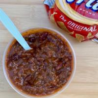 Beef Chili + Fritos · A slow-simmered beef and tomato two-bean chili. Plus a bag of Fritos!