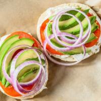 Coast To Coast (Vegan Option Available!) · Onion bagel (suggested), plain cream cheese (suggested), tomato, avocado, red onion. (For ve...