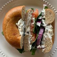 Sleek Greek (Vegan Option Available!) · Pesto Parmesan bagel (suggested),  our *new* olive cream cheese (suggested), tomato, spinach...