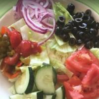 Garden Salad · Iceberg lettuce, tomatoes, cucumbers, red onions, black olives, and sweet peppers.