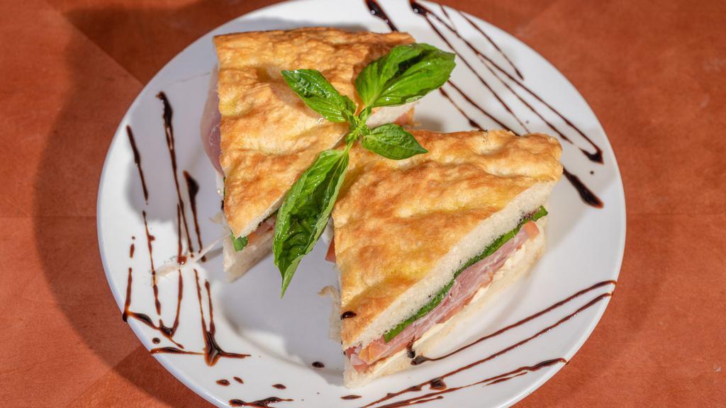 Caprese Sandwich · Prosciutto, fresh mozzarella, sliced tomato, basil and balsamic glaze.