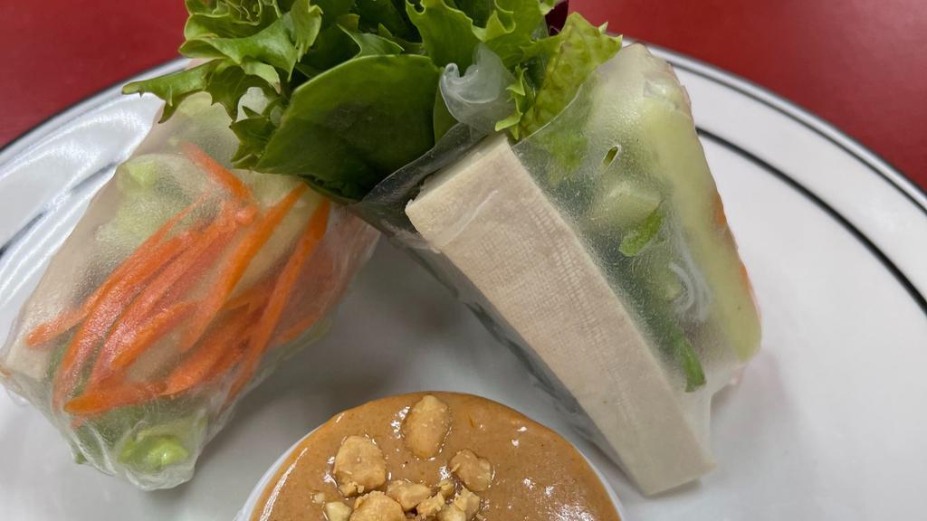Thai Basil Soft Roll With Tofu · Two soft wrapped spring rolls filled with rice noodles, basil, carrot, spring mix, cucumber, and tofu. Served with a peanut sauce.