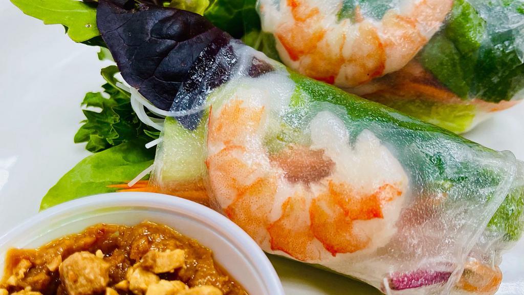 Thai Basil Soft Roll With Shrimp · Two soft wrapped spring rolls filled with rice noodles, basil, carrot, spring mix, cucumber, and shrimp. Served with a peanut sauce.