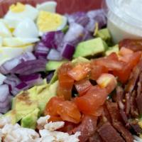 Cob Salad · Mixed greens, tomato, red onion, bacon bits, boiled egg, cheese, avocado.