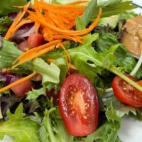 Rose'S Salad (Full Order) · Mixed greens, tomato, red onion, cucumber, carrot, and peanut sauce.