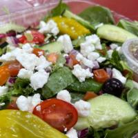 Greek Salad · Mixed greens, cucumber, tomato, red onion, kalamata olives, pepperoncinis and feta cheese.