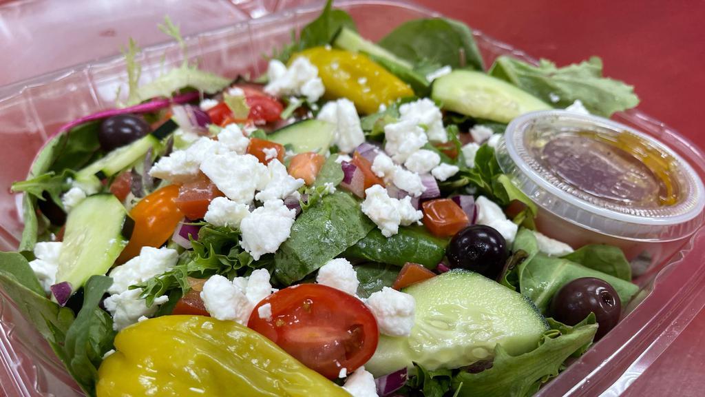 Greek Salad · Mixed greens, cucumber, tomato, red onion, kalamata olives, pepperoncinis and feta cheese.