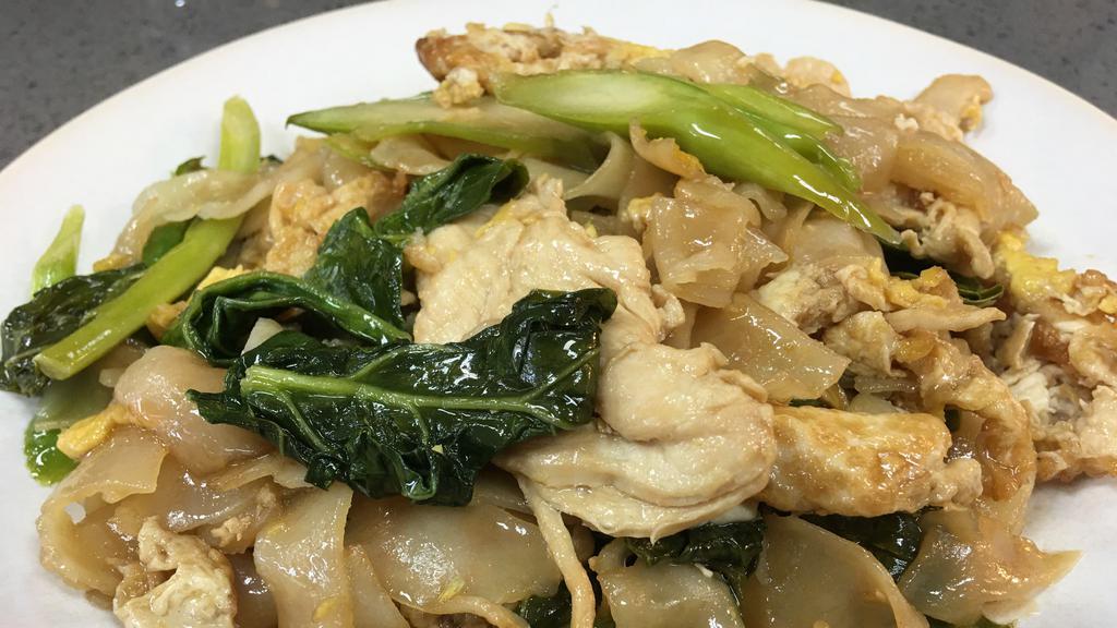 Chicken Pad-Si-Ew · Wide rice noodles, stir fried with egg, broccoli, and chicken in our special Pad-Si- Ew sauce.