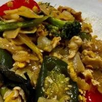 Chicken Pad Kee Mao  · Flat noodles (drunken noodle), sauteed with egg, jalapeno peppers, yellow onion, and tomato ...