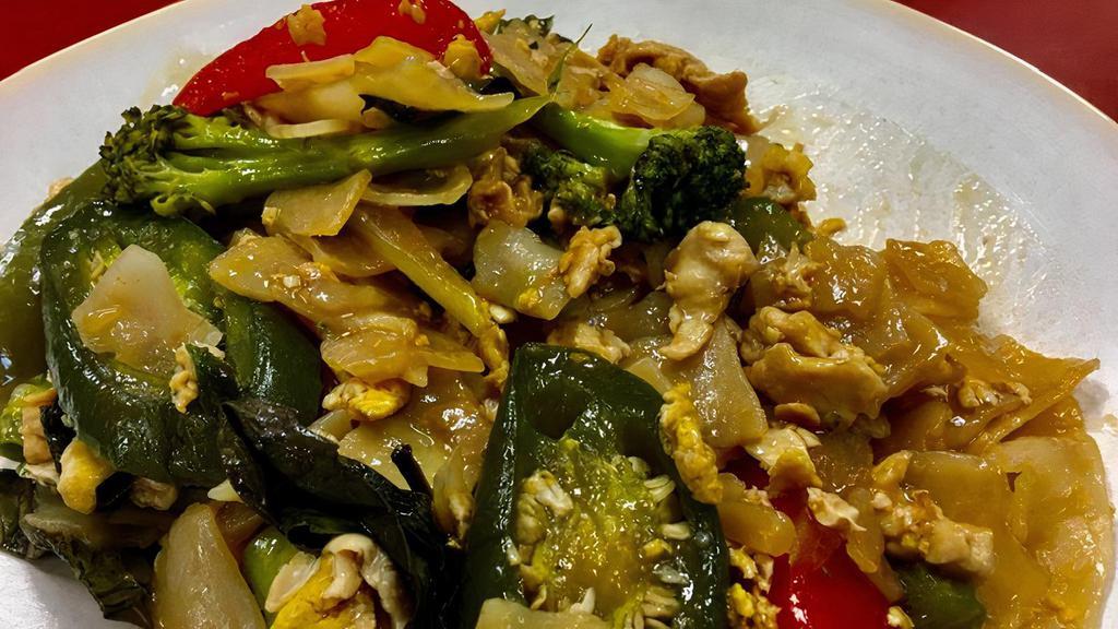 Chicken Pad Kee Mao  · Flat noodles (drunken noodle), sauteed with egg, jalapeno peppers, yellow onion, and tomato in our flavorful Pad Kee Moa sauce.