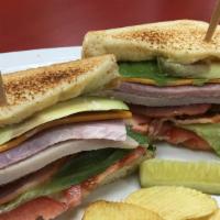 The Ultimate Club · Thick cut ham, roasted turkey, bacon, lettuce, tomato, avocado, mayo, and your choice of che...
