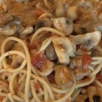 L Chicken Marsala · Sauteed with mushrooms in a marsala wine sauce served with spaghetti.