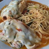 L Veal Saltimbocca · Sauteed in marsala wine sauce topped with spinach, prosciutto and mozzarella served with spa...